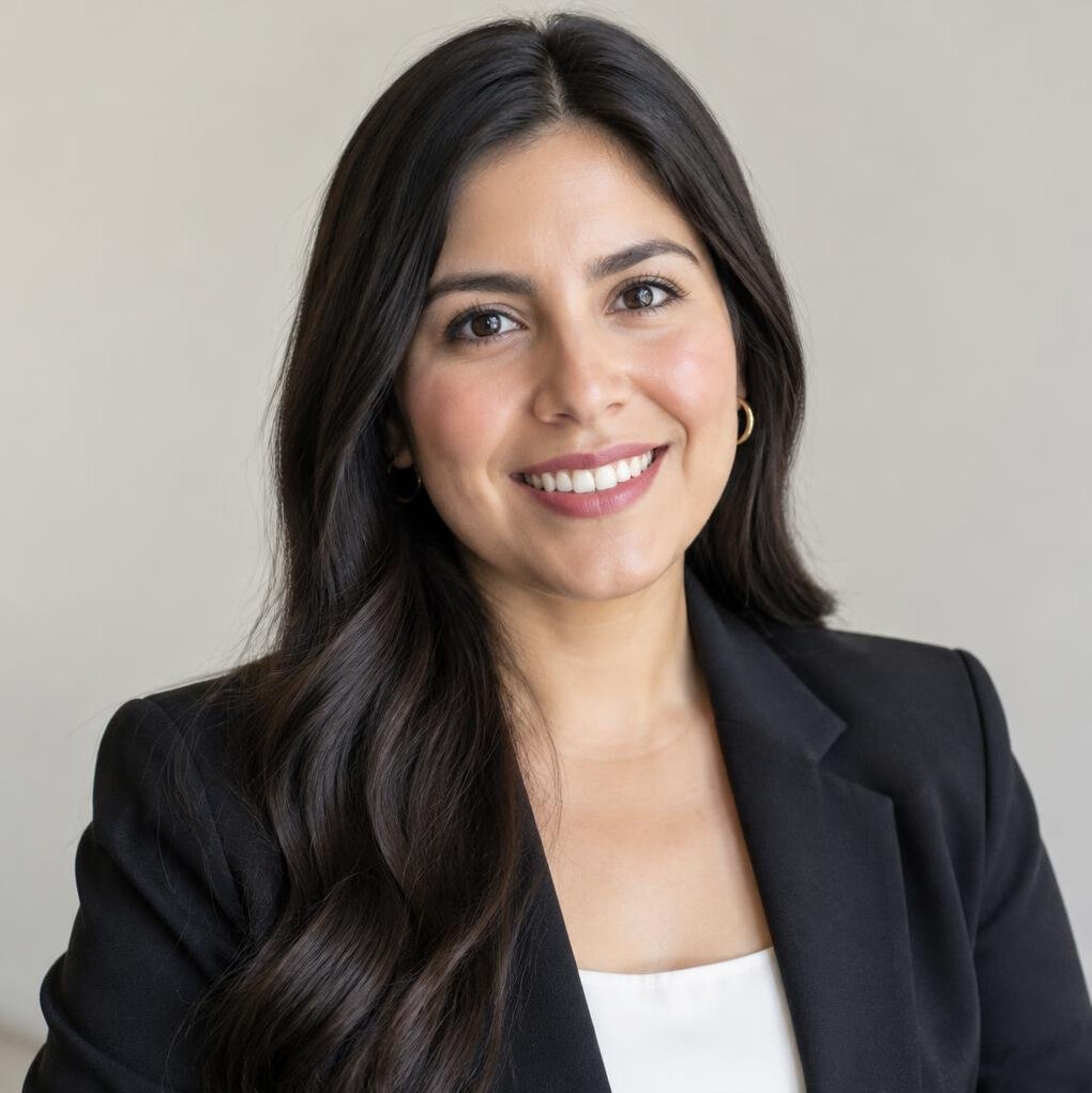 Portrait of a smiling Latina woman with long dark hair