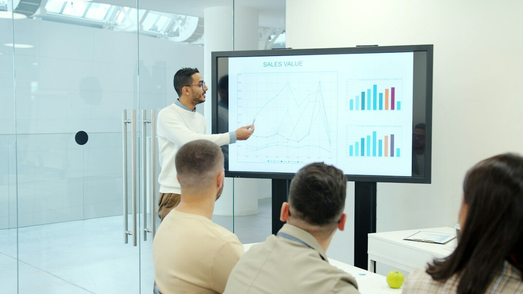 man giving presentation to audience